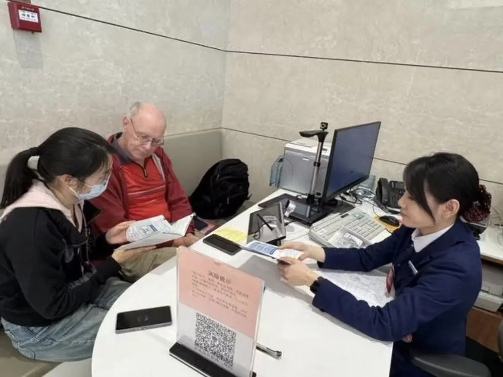 Foreigner local assistance in China with documents, phone, maps, and appointment notes